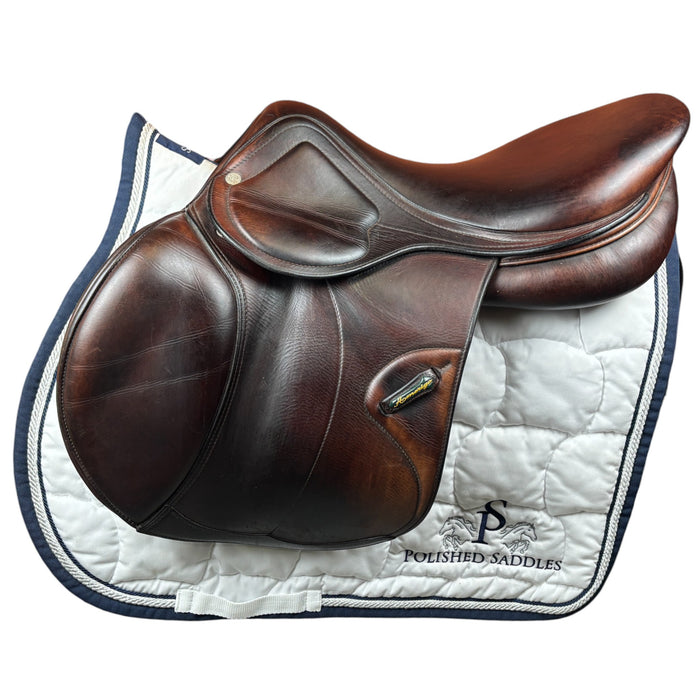 Amerigo CC Jumping saddle in brown leather saddle on a white quilted saddle pad with 'Polished Saddles' branding.