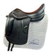 Black Amerigo Vega Dressage saddle on a white quilted saddle pad with 'Polished Saddles' branding.